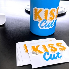 Kiss Cut Sticker on Table and Water Bottle